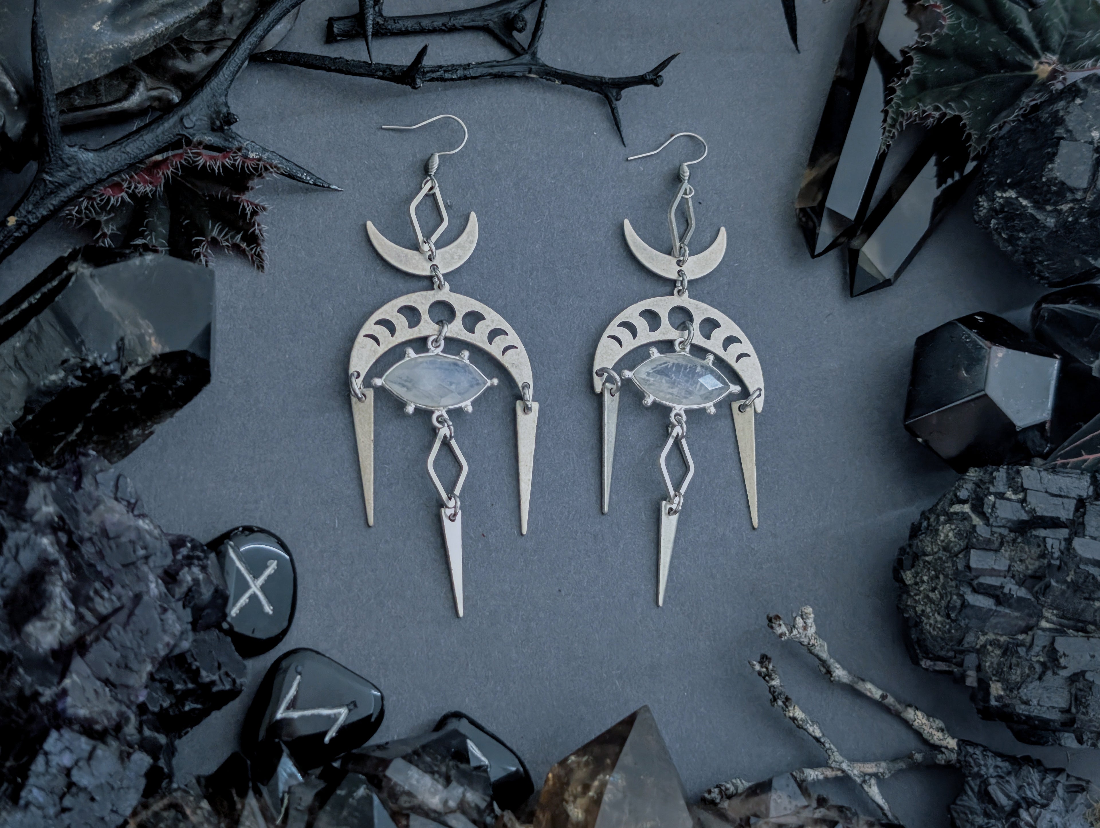 Handcrafted earrings in either silver plated or raw brass featuring moonstone created by Hexian in Australia