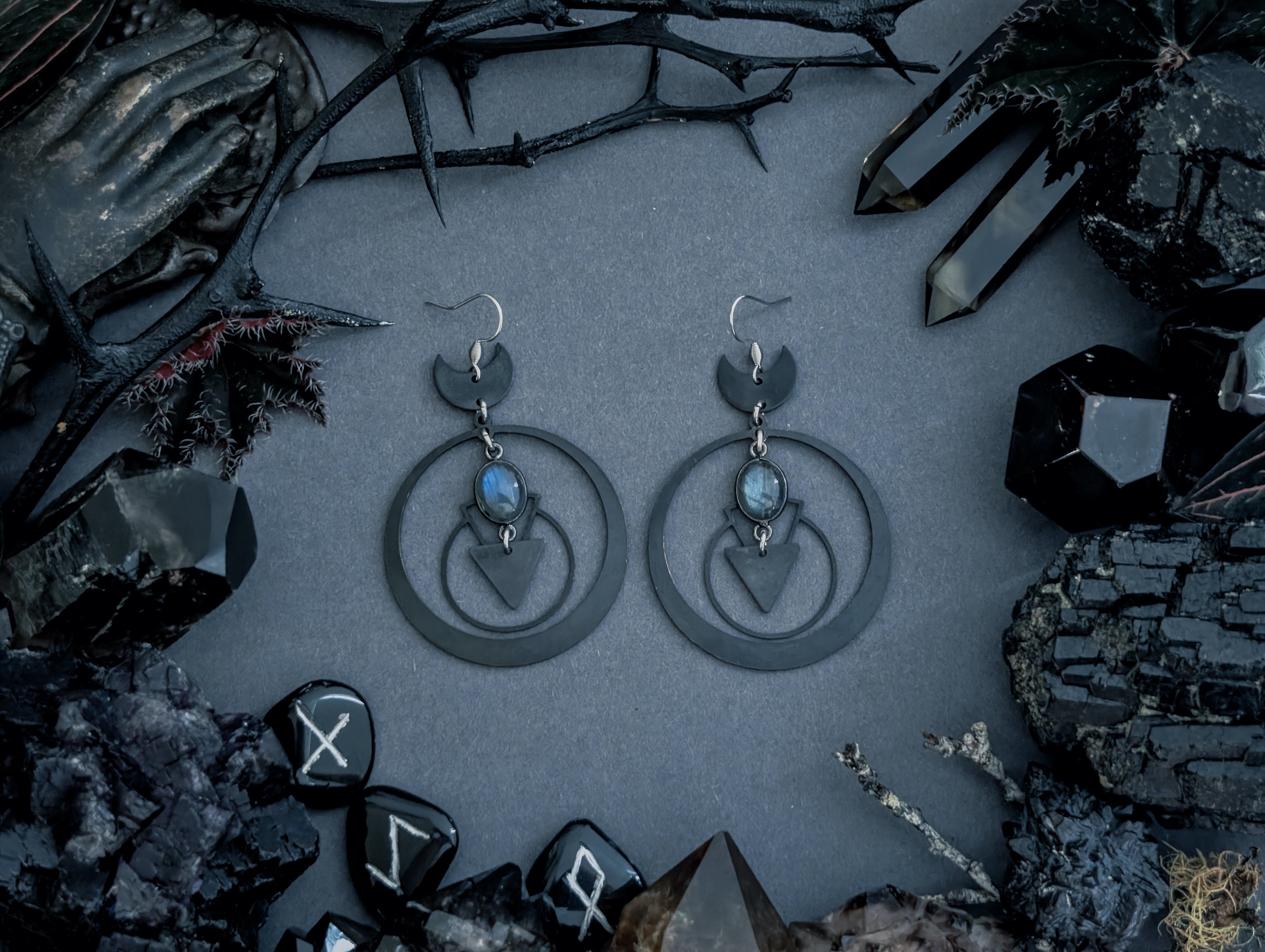 Handcrafted black earrings, featuring labradorite created by Hexian in Australia.