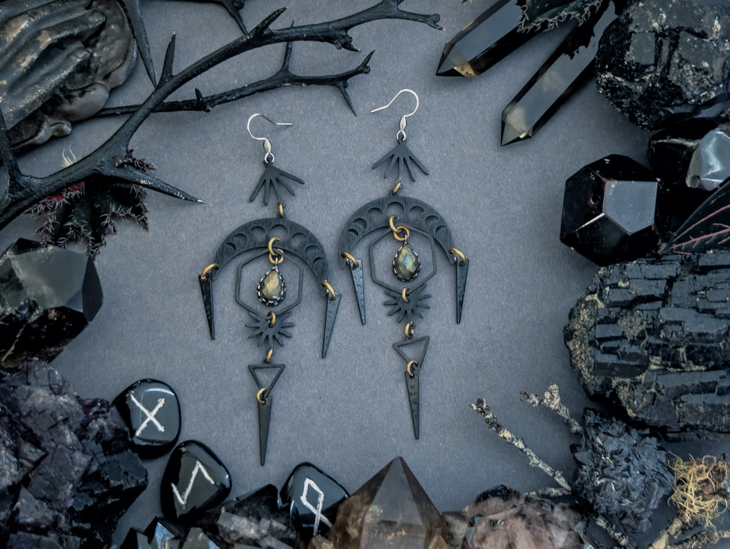Handcrafted black earrings featuring labradorite, created by Hexian in Australia.

